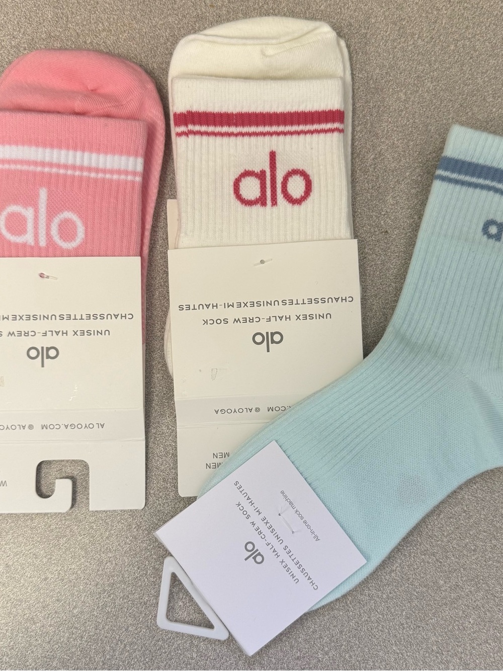 ALO Yoga Women’s half crew socks in Powder Pink , White , and Baby Blue NWT